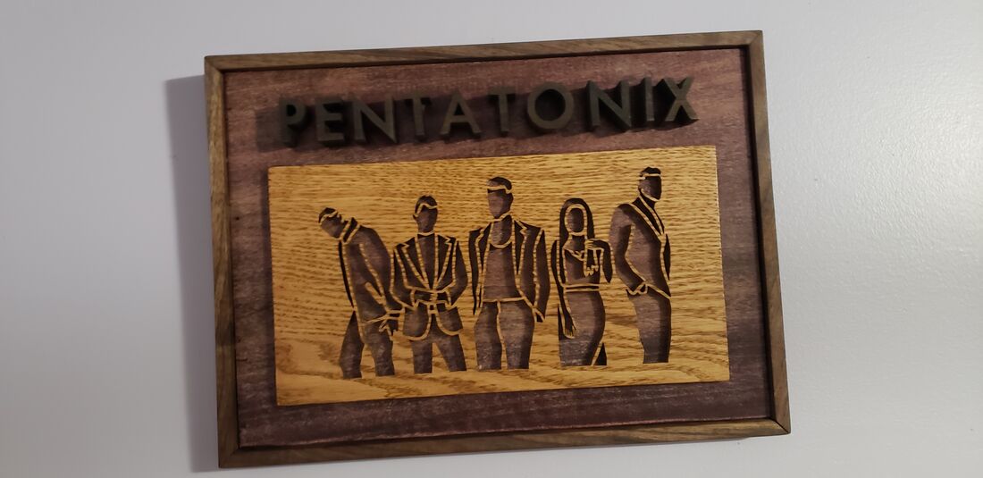Framed layered portrait of a five-member band