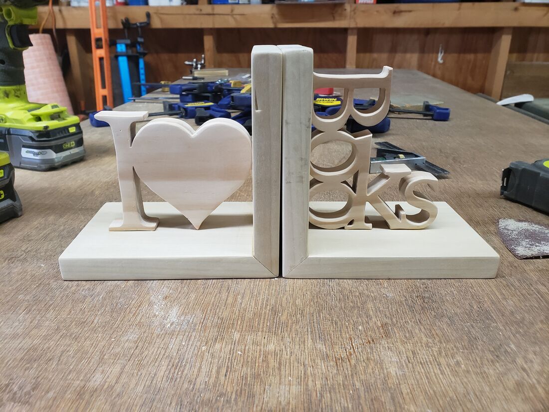 Pair of bookends: I, a heart, and the word Books